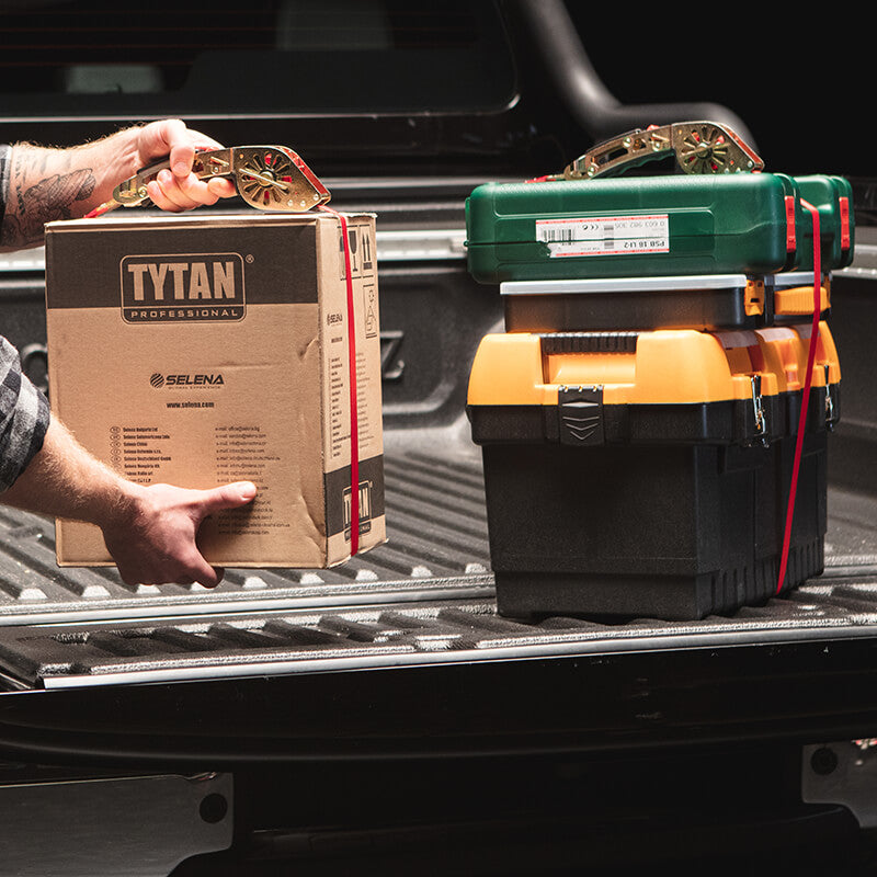 Four boxes tied with QUICKLOADER Grip Carrying Handle 